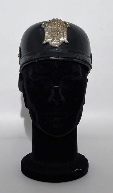 Leather helmet of fireman of a German city...