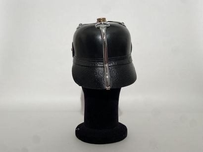 Leather helmet of fireman of a German city...