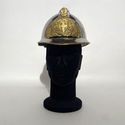 Chromed Adrian helmet of the marine firefighters...