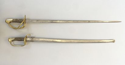 Lot of two sabers including : 
- an 1855...