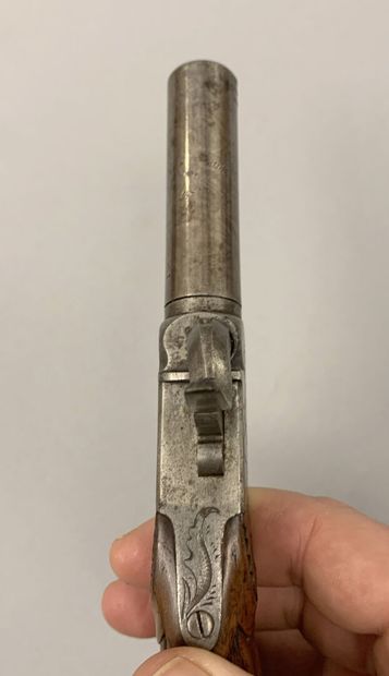 Percussion pistol with trunk with forced...