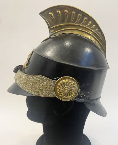 Fireman's crest helmet, blackened iron sheet...