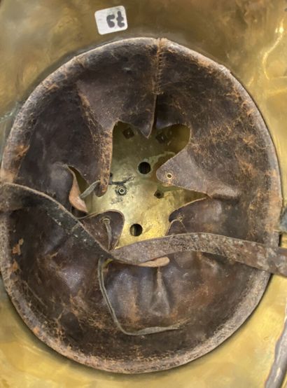Brass firefighter helmet of the city of Cognac,...