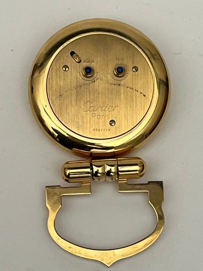 CARTIER Paris
Pendulette-réveil de bureau...