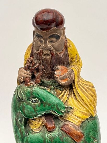 Zhoulao sur son daim, avec la pêche de longévité
Grès...