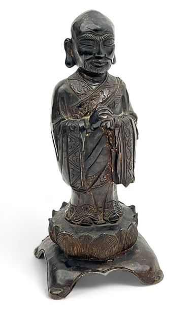 Sujet en bronze représentant Bouddha en prière...