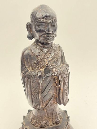 Sujet en bronze représentant Bouddha en prière...