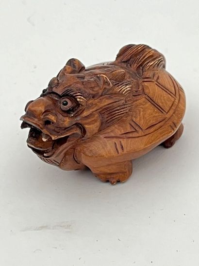 Petite statuette en bui représentant un dragon
Chine,...