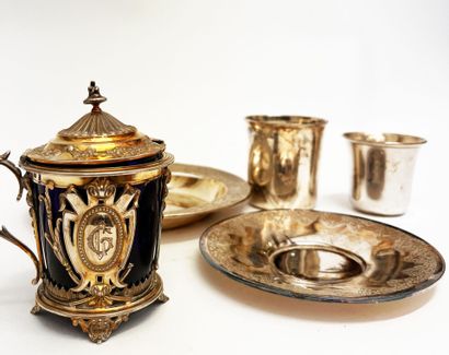 Silver set including: a coaster, a saucer,...