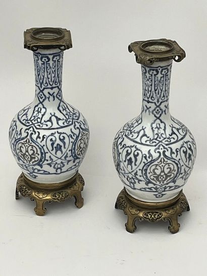 Pair of white porcelain baluster vases with...