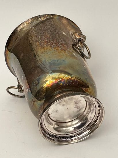 A silver-plated champagne bucket
H: 24 c...