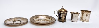 Silver set including: a coaster, a saucer,...