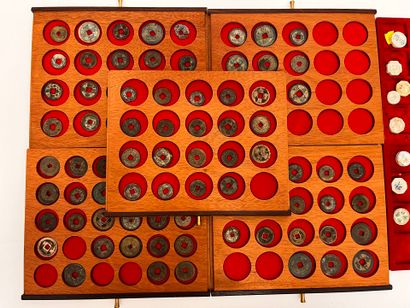 Lot of five trays of Annam coins and tokens
Two...