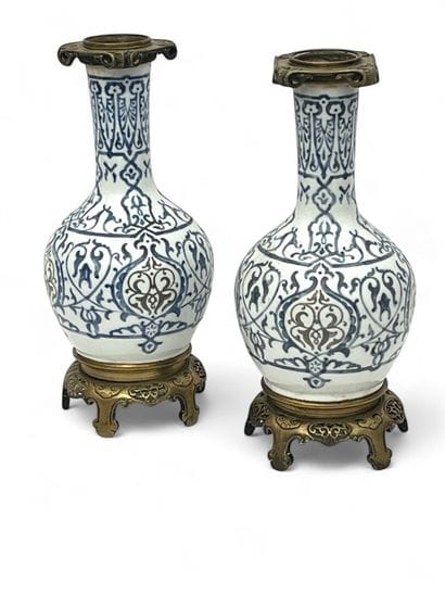 Pair of white porcelain baluster vases with...