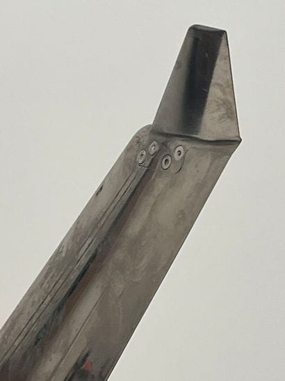 CONTEMPORARY WORK
Chromed metal wing in the...