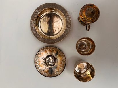 Silver set including: a coaster, a saucer,...
