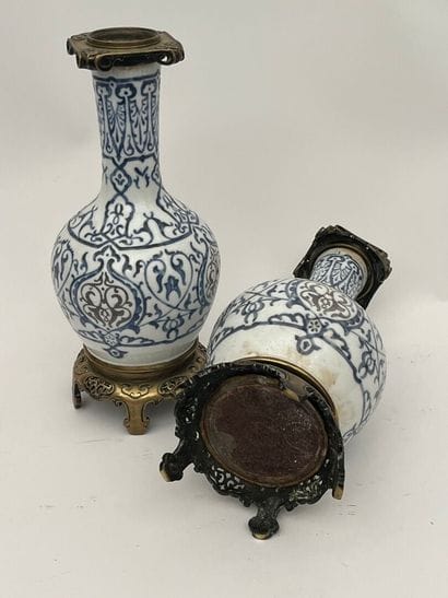 Pair of white porcelain baluster vases with...