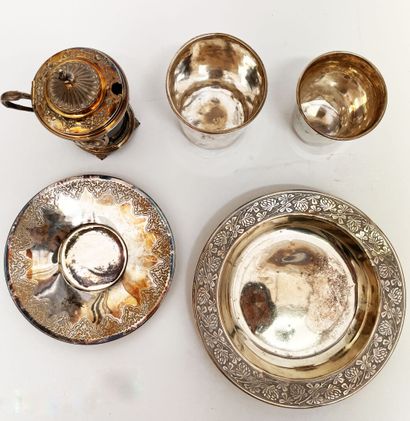 Silver set including: a coaster, a saucer,...