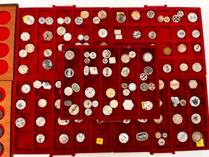 Lot of five trays of Annam coins and tokens
Two...