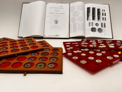 Lot of five trays of Annam coins and tokens
Two...