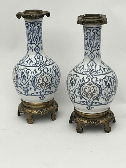 Pair of white porcelain baluster vases with...