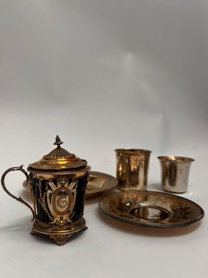 Silver set including: a coaster, a saucer,...