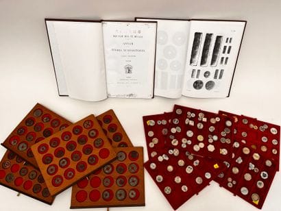 Lot of five trays of Annam coins and tokens
Two...