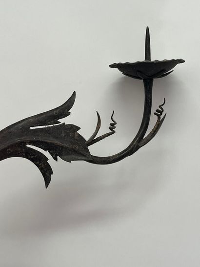 Pair of iron sconces with foliage motif.
L...
