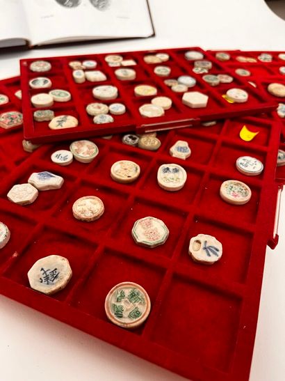 Lot of five trays of Annam coins and tokens
Two...