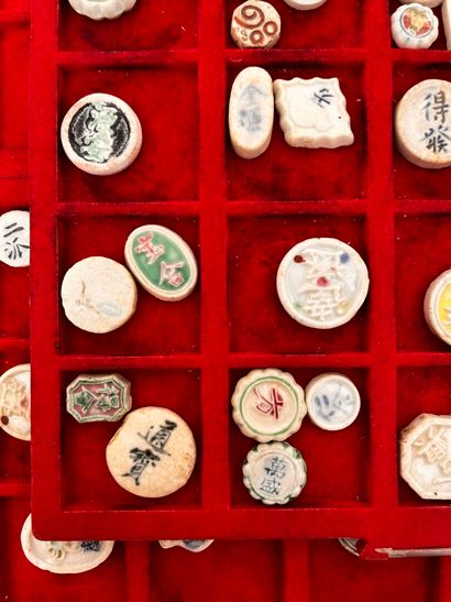 Lot of five trays of Annam coins and tokens
Two...