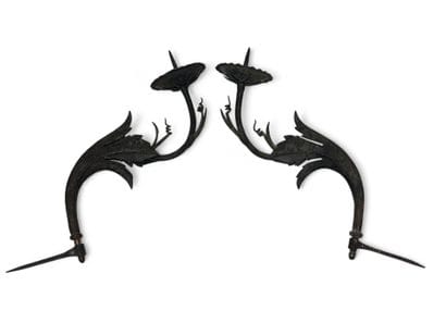 Pair of iron sconces with foliage motif.
L...