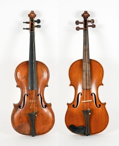 Set of two 4/4 violins in their cases, including...