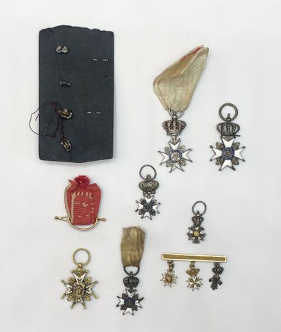Set of 4 silver and enamel reductions of...