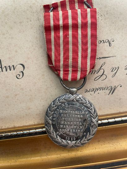 Attractive frame containing a diploma and...