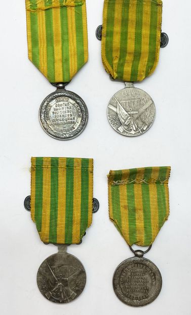 Lot of four decorations relating to the colonial...