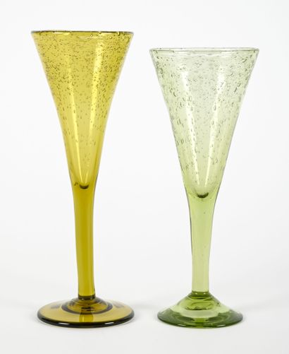 BIOT 
Suite of twelve olive green champagne...