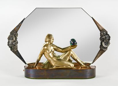 Cut-edge table mirror resting on a bronze...