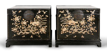 A pair of black lacquered wood wedding chests...