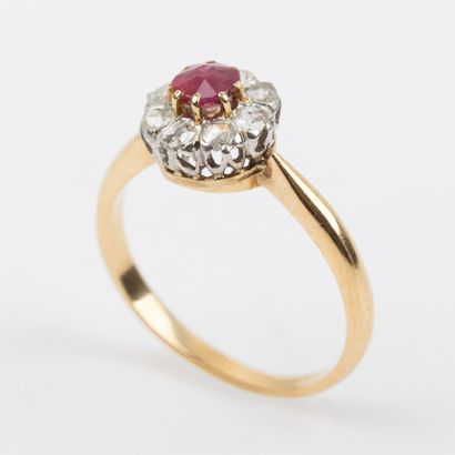 Ruby daisy ring, surrounded by rose-cut diamonds;...