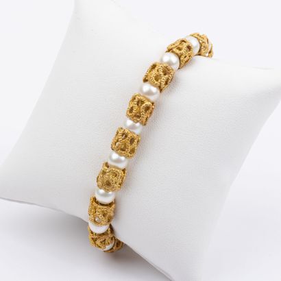 Semi-articulated bracelet, cultured pearls...