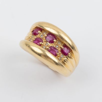 Band ring paved with rubies and 8/8-cut diamonds,...