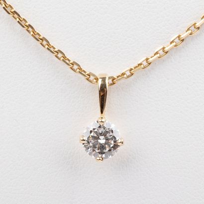 18K gold forçat chain and 0.70 carat brilliant-cut...