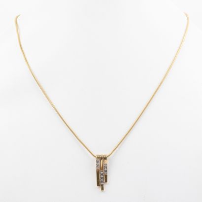 18K gold chain finished with a pendant with...