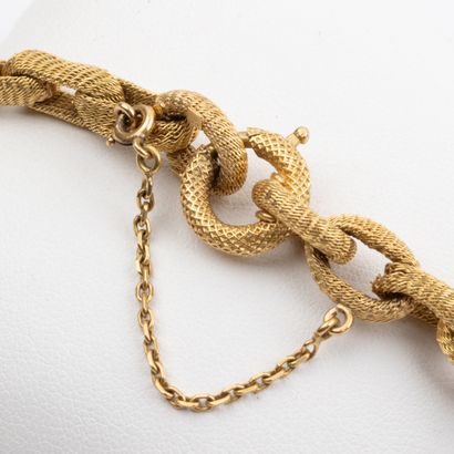18K gold bracelet, textured marine mesh
Circa...