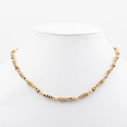 Semi-articulated necklace in textured 18K...