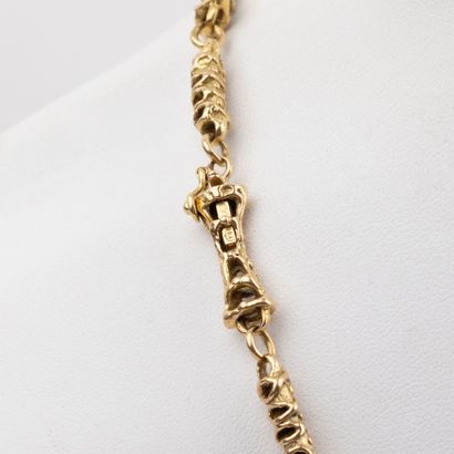Semi-articulated necklace in textured 18K...