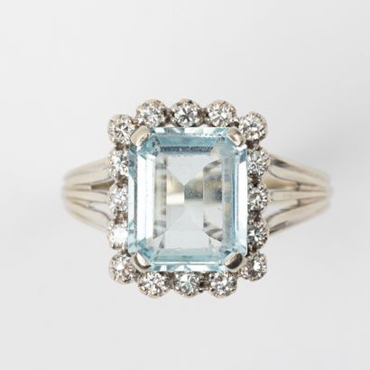 Aquamarine cocktail ring, surrounded by brilliant-cut...