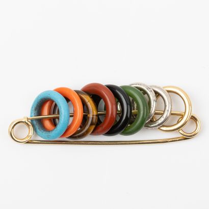 DINH VAN 
Safety pin and rings, one in 18K...