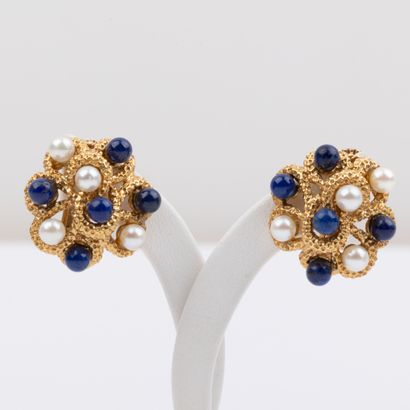Pair of ear clips decorated with stylized...