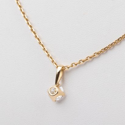 18K gold forçat chain and 0.70 carat brilliant-cut...